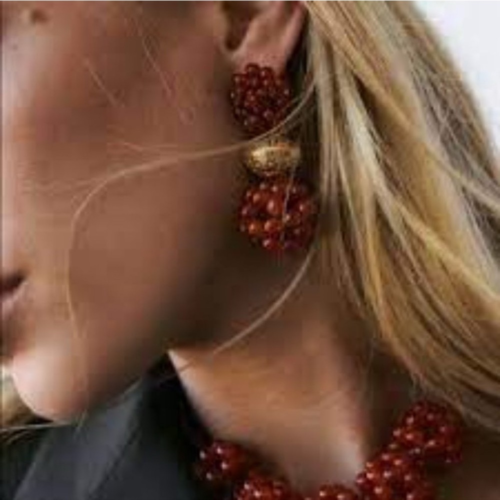 Zara Grace under fire gold bras mismatched clip on earrings Rare